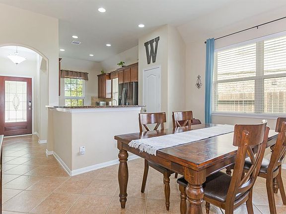 Once inside, this light and airy home is warm and inviting for all that enter!