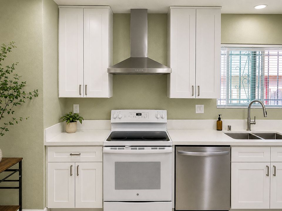 BRAND NEW remodeled kitchen, new countertops, cabinets, sink, faucet, blinds and appliances