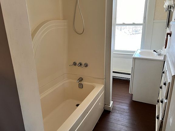 Bathroom with two entrances; bedroom and kitchen