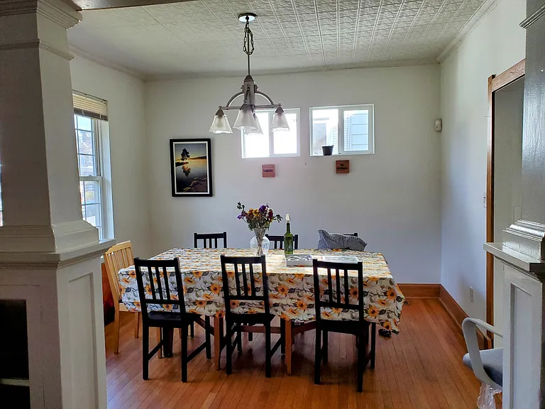 Furnished dining room. Housemates may move furniture around and add their own home decor.