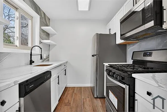 4570 Macarthur Blvd NW #208 — Photo 11