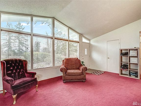 Abundant natural light fills the living room. 
