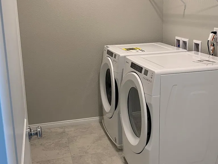 A second floor laundry room is ideal! Washer and dryer are included.