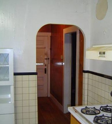 Kitchen looking into hall