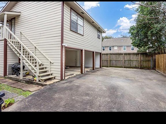 the home enjoys a tranquil setting in the back of the property