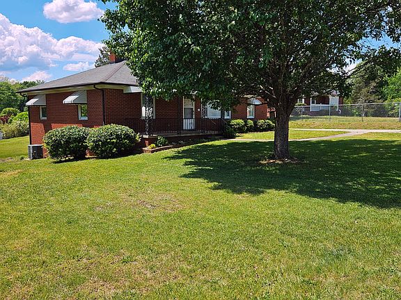 Lovely, partially shaded front yard.