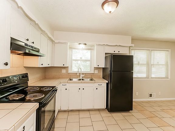 5th image of 9805 Drury Ave