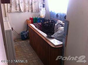 LAUNDRY ROOM AND JACUZZI