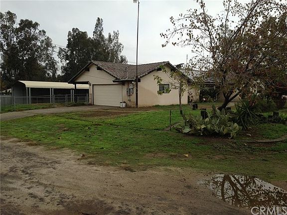 Garage and Large Covered Shed in back yard