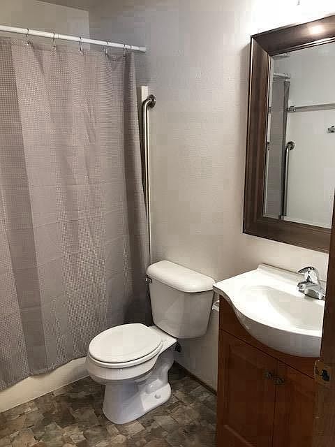 updated bath with shower/tub combo