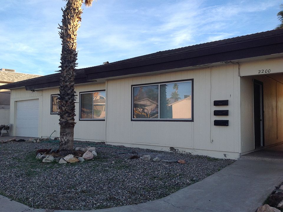 Front of unit with garage