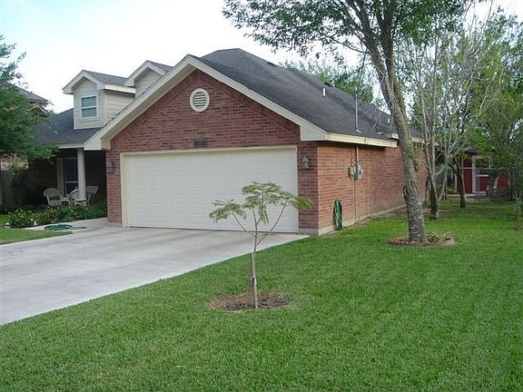 Garage pecan trees