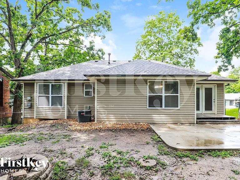 5905 NW Whispering Oaks Ln — Photo 18