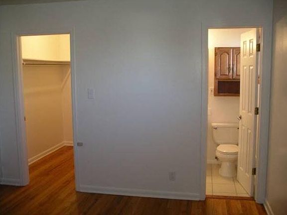 Master Bedroom with attached 3/4 bath and walk in closet
