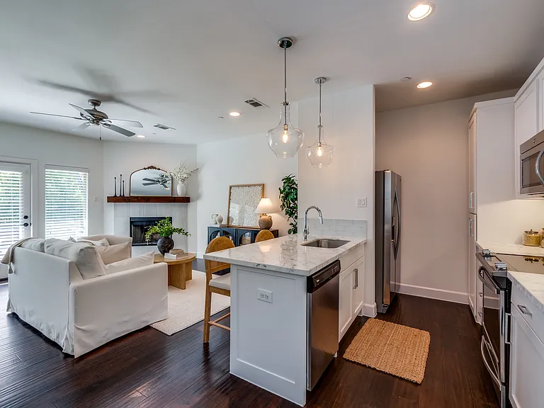 **Photos of Unit 1 to show lived in potential. Unit 5 is the same floorpan, finish outs and size.**