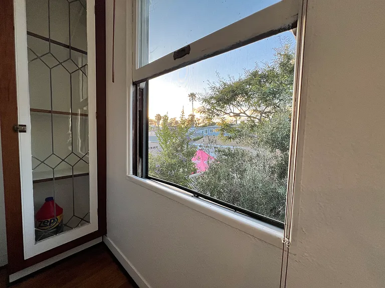 this is a second floor unit of duplex so you share no wall no one above and only one person below. Nice views and lovely 105 year old details everywhere