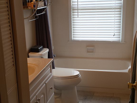 New tile, vanity, toilet