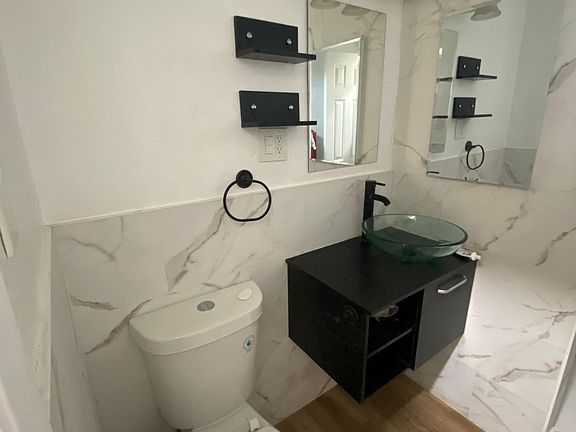 New bathroom, toiler and sink.