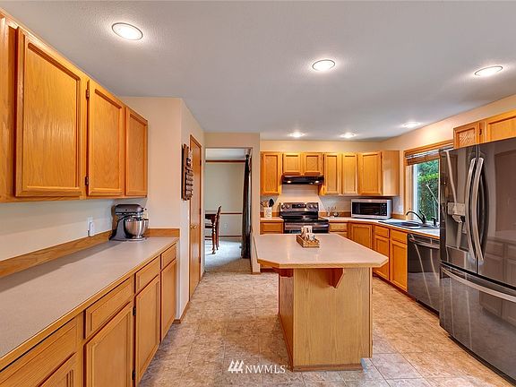 Large kitchen with center island. Plenty of room for more than 1 cook.