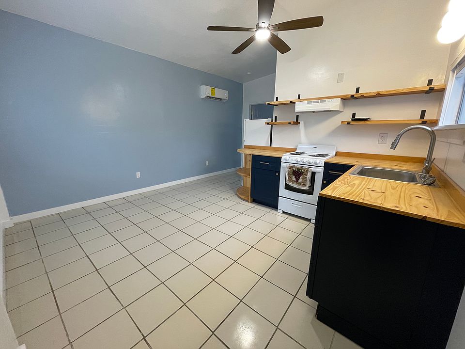 Kitchen & front room view from entry door
