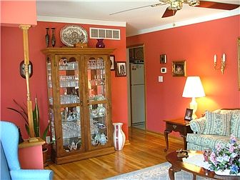 Living Room has Crown Moulding & Hardwood Floors