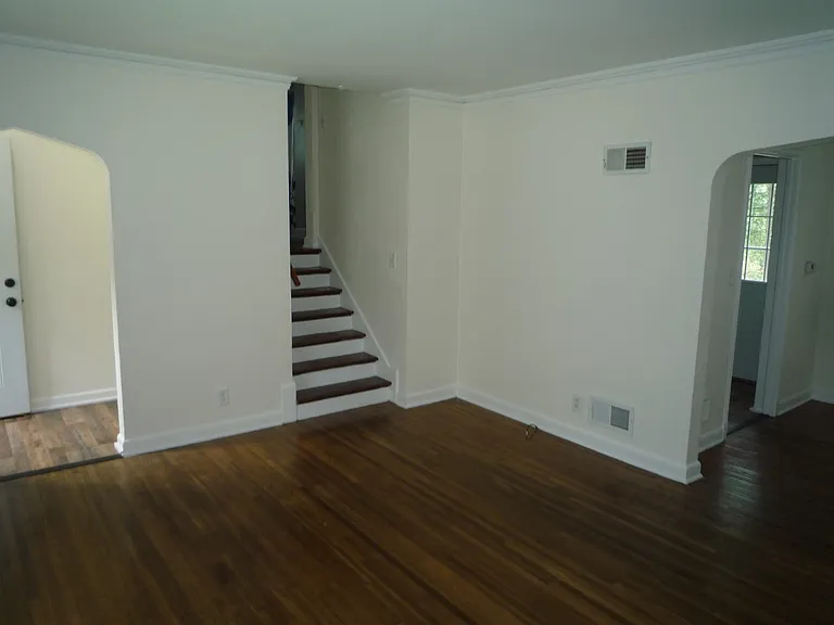 In the living room, dining room to your right, bedrooms upstairs