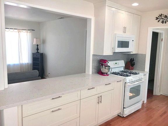 Kitchen opens up to the living room