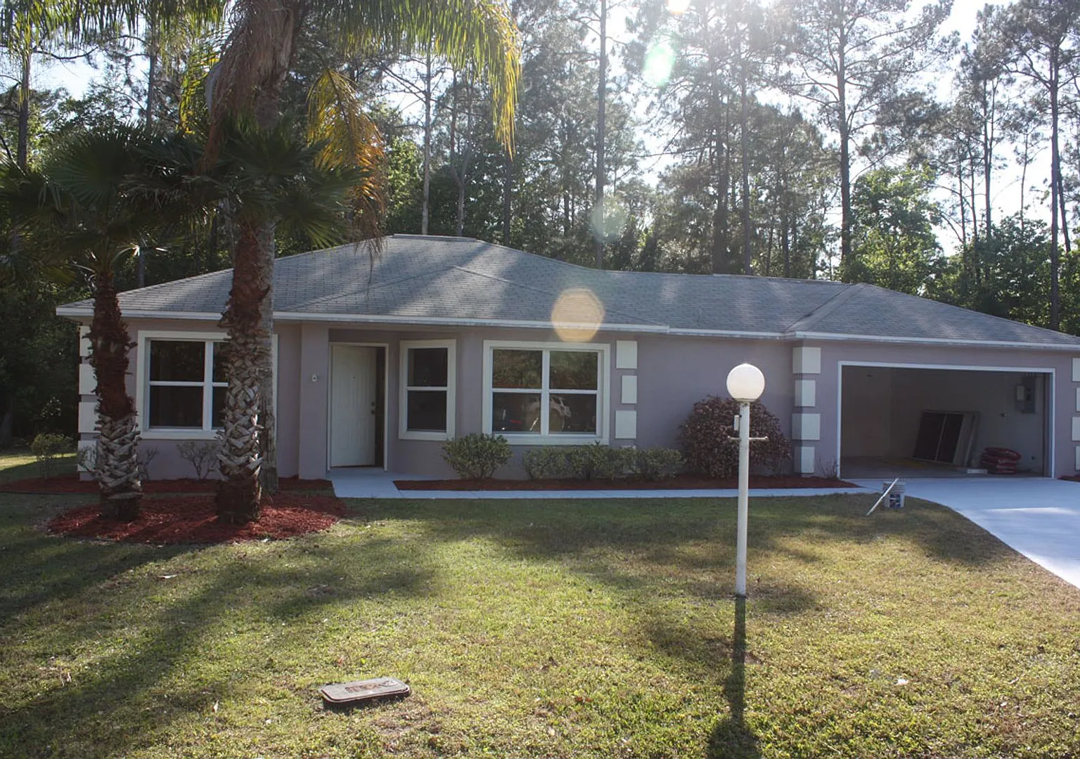 Unique 2/2/2 with Air-Conditioned Florida Room! — Photo 1