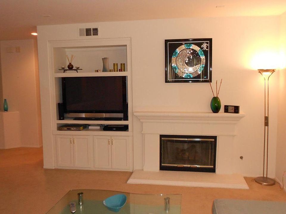 Huge great room w/fireplace, built-ins and walkout deck.