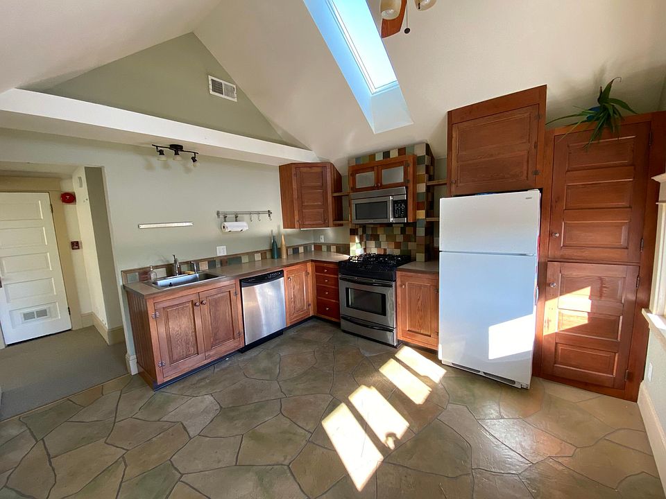Kitchen with decorative cement floor.