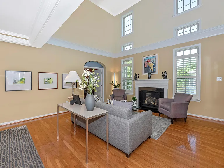 The 2 gray arm chairs are no longer at this property