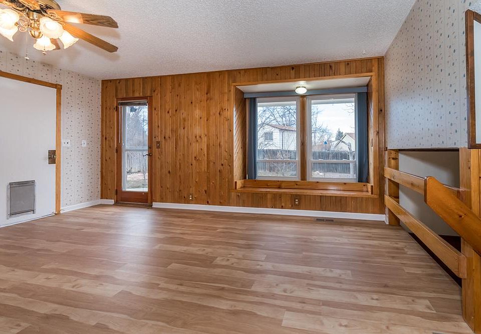 Eating area off kitchen with door to back yard