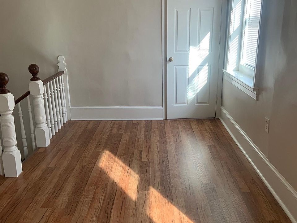 Living Room with Beautiful Laminated Flooring