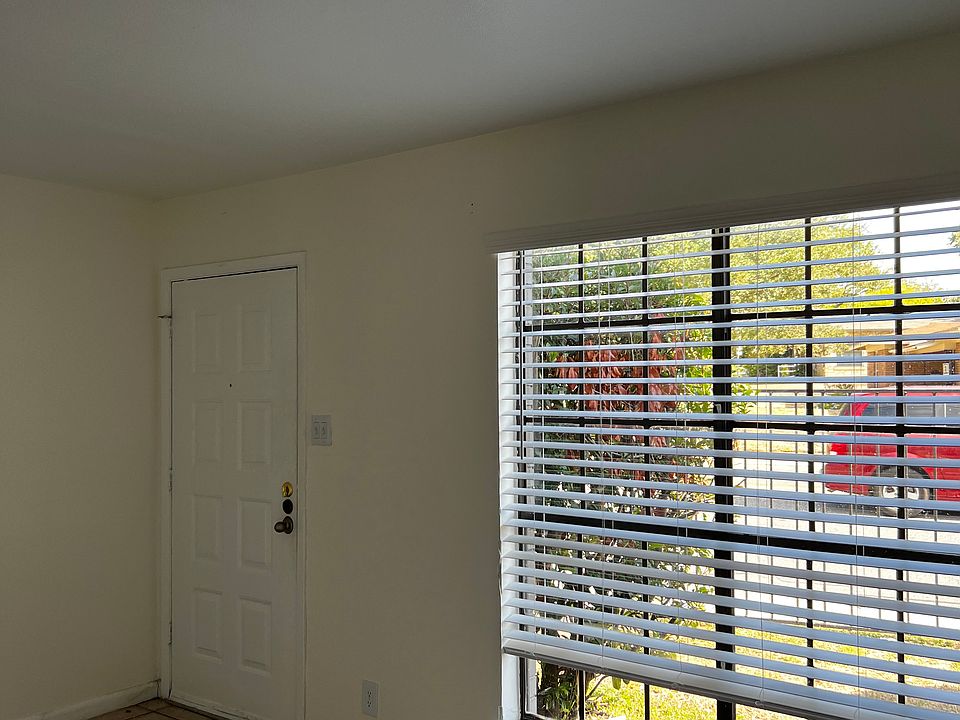 Large window in living room to let in plenty of natural light