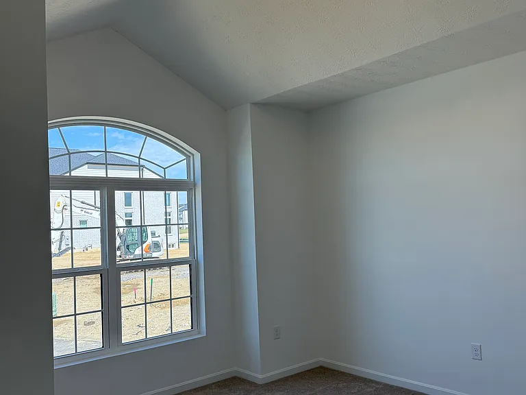 Bedroom #1 (main floor) with vaulted ceiling
