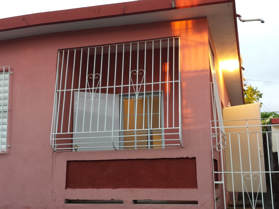 Front of home and balcony