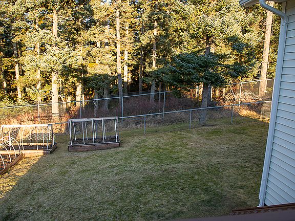 Fenced back yard from deck