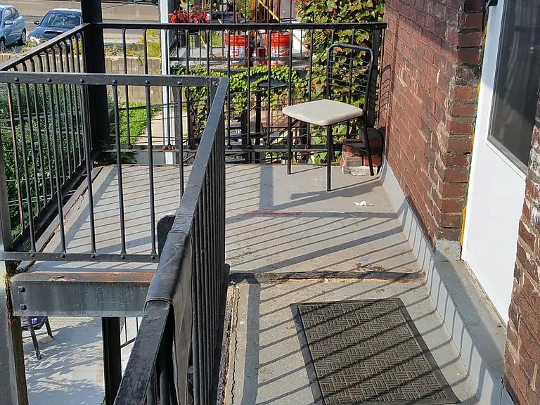 The apartment is on the 2nd and 3rd floor of the row-house. It features a small balcony for outdoor seating over looking the back yard, ellsworth ave and directly across the train tracks is the Wine and Spirits store - you're close to Everything - Whole F