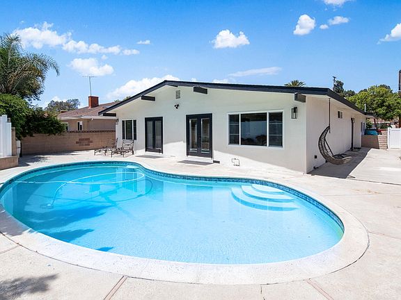 In-ground pool. Low maintenance backyard.