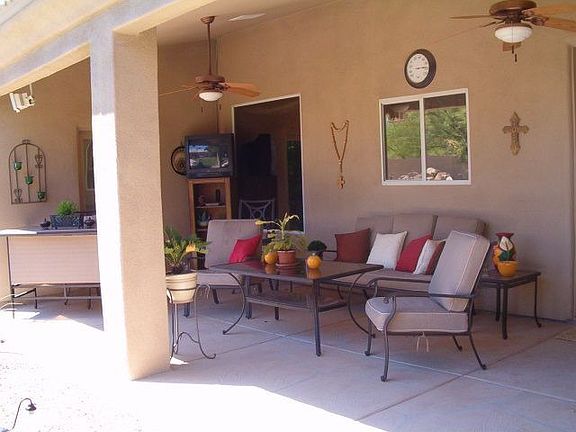 Large covered patio accessible from masterbedroom