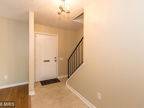 Entryway-(Porcelain Tile flooring(thru to Kitchen)