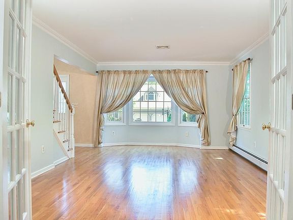 Light, bright and elegant Living Room with French Doors