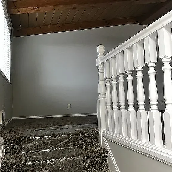 Stairs heading to lower level.