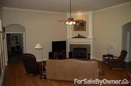 Living Room : Spacious Open living room with ventless gas log fireplace and bamboo floor.
