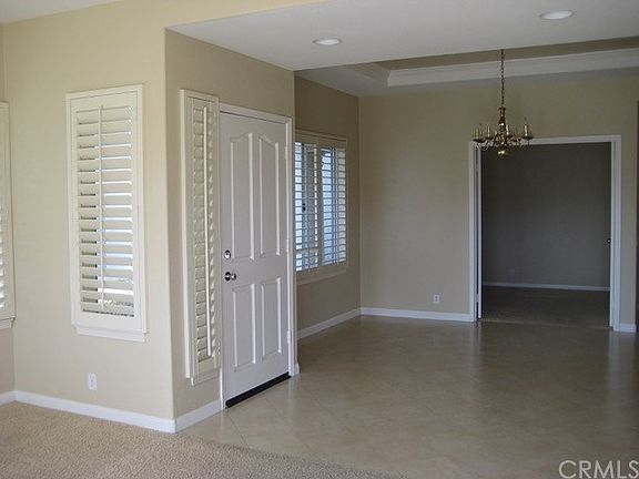 Entry into the home. Dinning room and second bedroom.