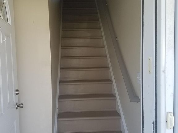 Stairs going to the 2nd fl apt