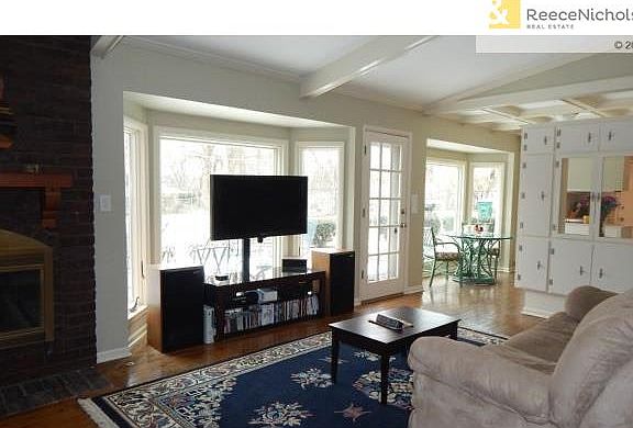 Fire place in the family room. View to the patio from family roo