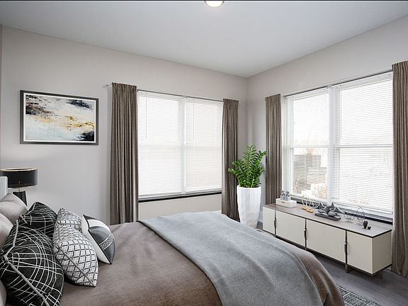 Bedroom with Large Corner Windows