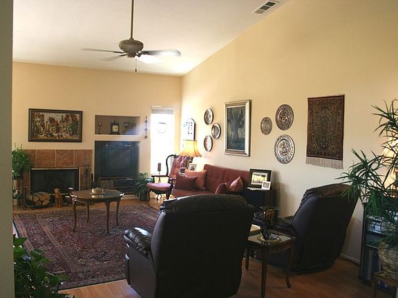 Family Room with fireplace and custom paint.