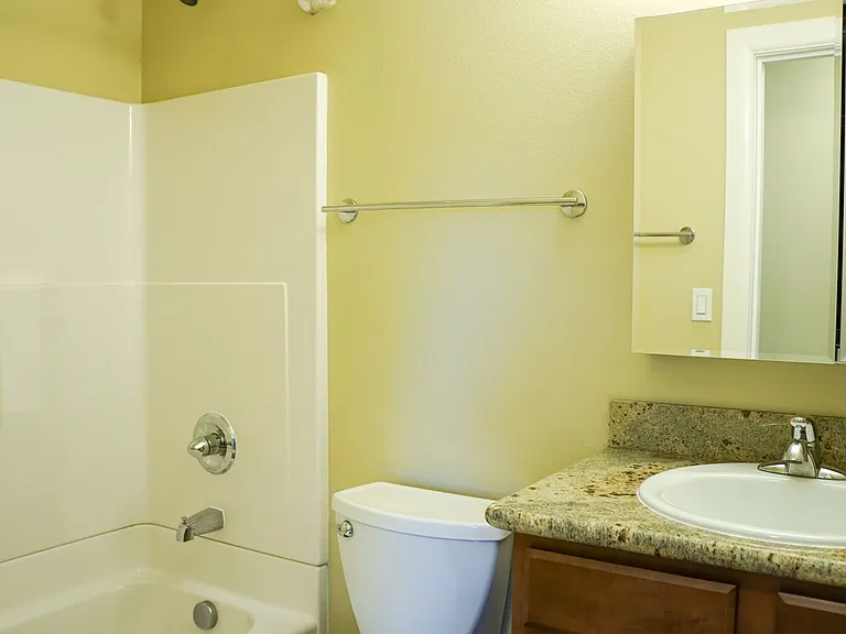 Top-Floor 2-Bedroom with Bamboo Flooring + Off-Street Parking! — Photo 11